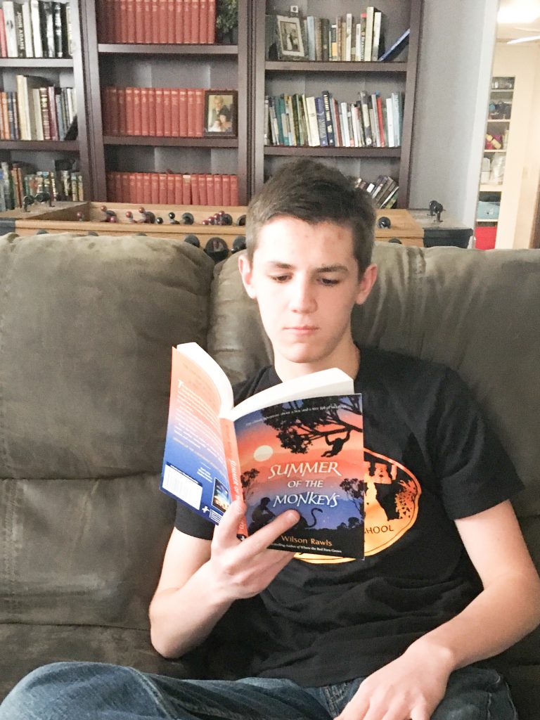 boy reading at home